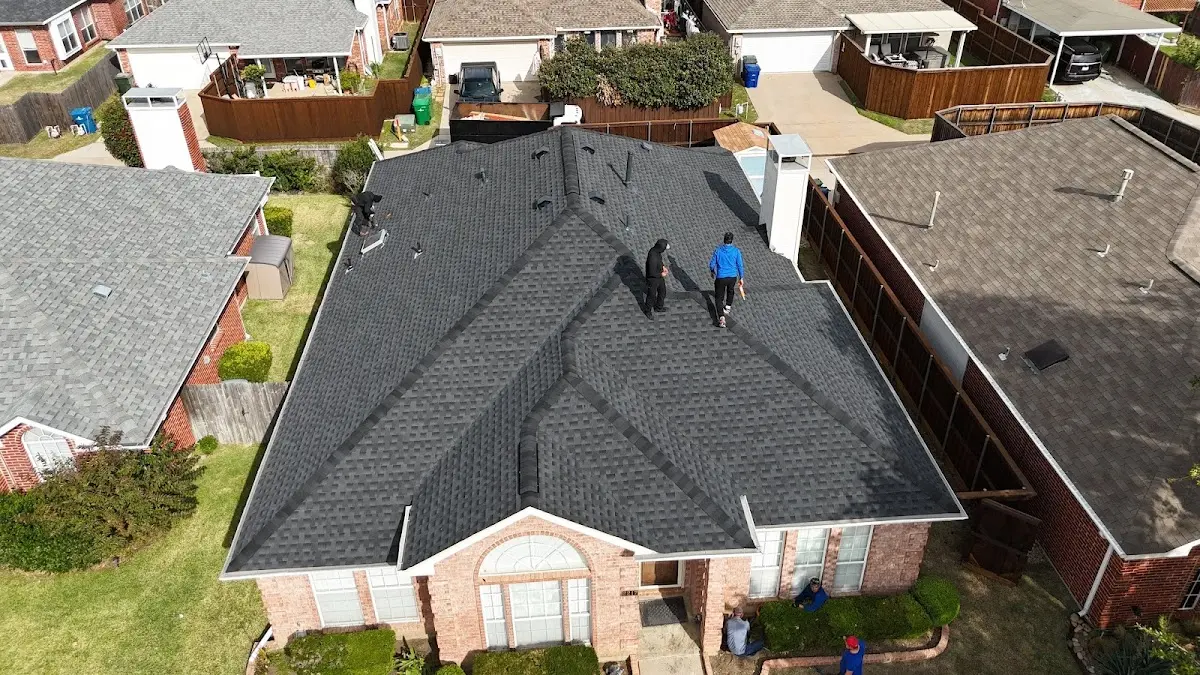 Slate & Tile Roof Repair work in progress on a Overland Park property